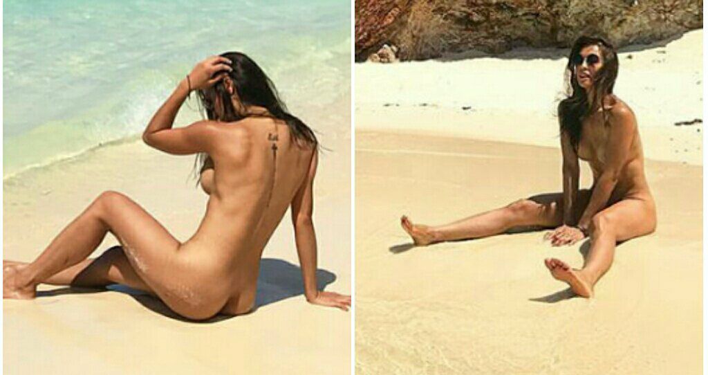 Aubrey Miles naked on the beach. 